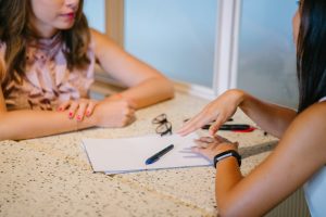 Candid Image of Two Women Talking