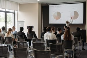 A photo of a presentation and the audience.